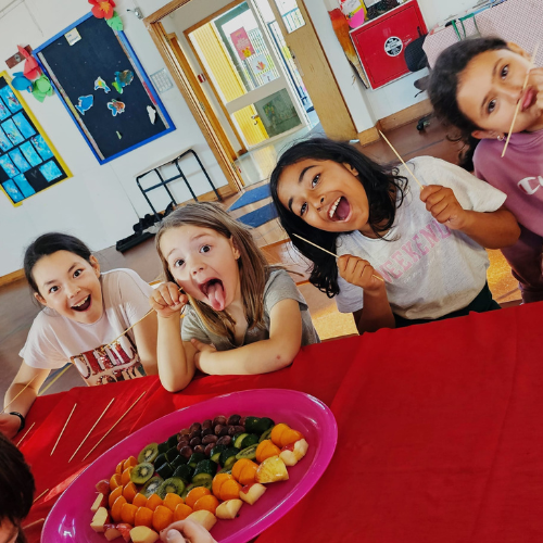 kids smiling while eating